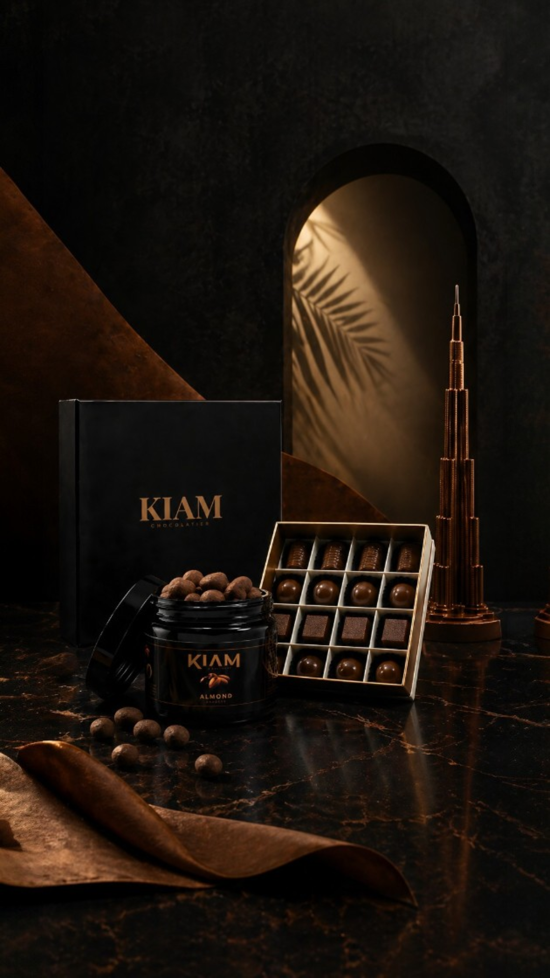Premium KIAM Chocolatier assorted chocolate gift boxes with almond dragees and Dubai souvenir collection display